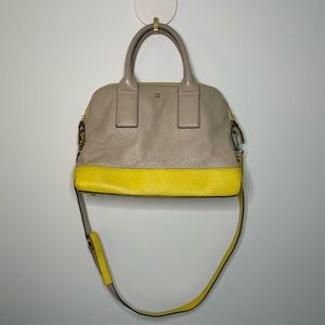 Kate Spade two tone purse with gold hardware. Yellow and cream, 2 length handles